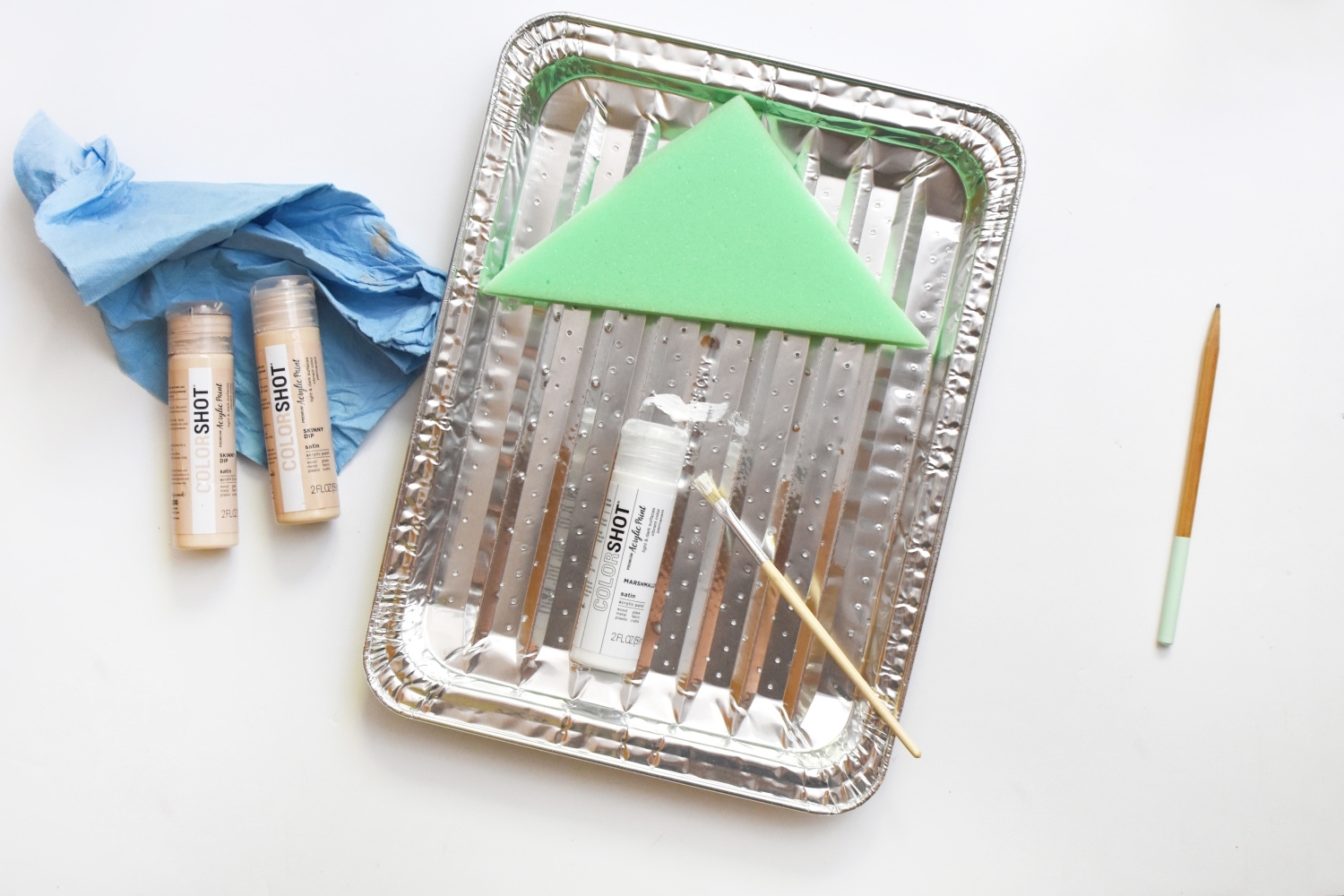 Apply paint to stamps, tapping excess off onto a disposable tray
