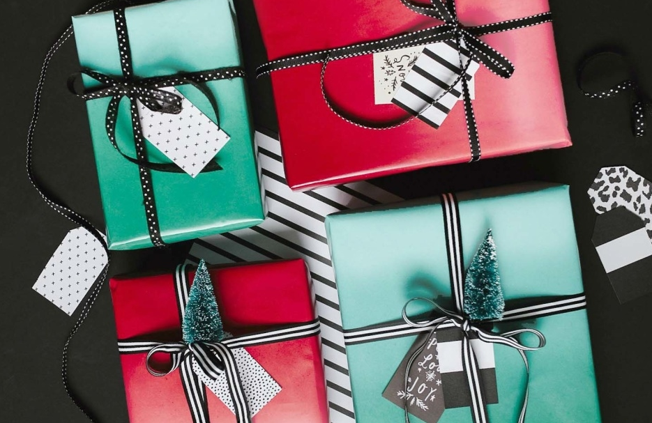 Green and red ombre gift wrap with monochrome ribbon