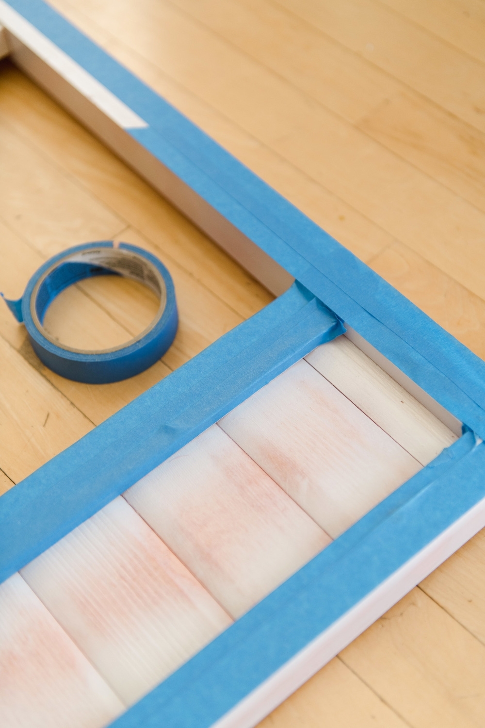 Paint edge pieces, allow to dry, and cover with painter’s tape