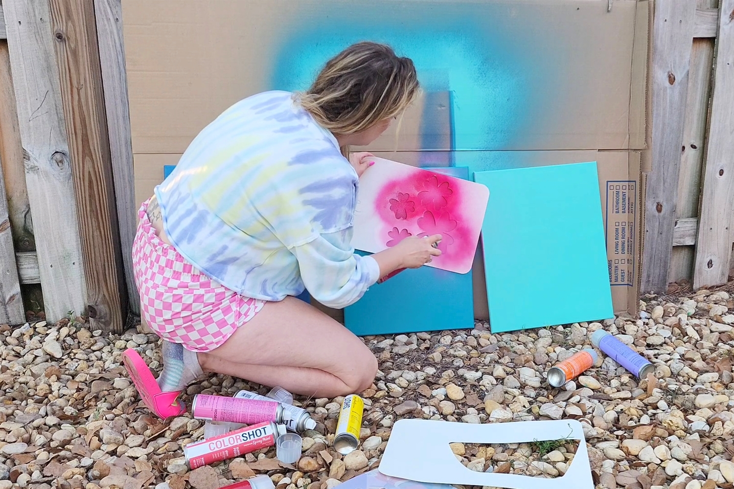 Use a stencil to spray paint flowers